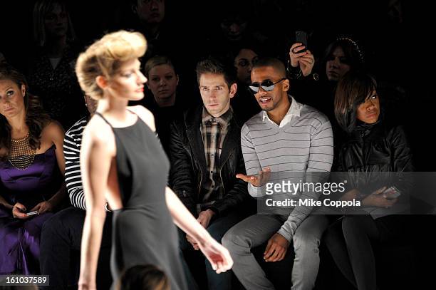 Actors Eric West and Tichina Arnold attends the Project Runway Fall 2013 fashion show during Mercedes-Benz Fashion Week at The Theatre at Lincoln...