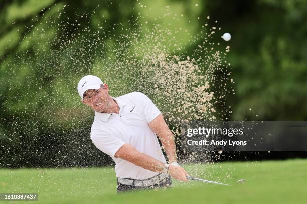 Rory McIlroy of Northern Ireland plays a shot from a bunker on the tenth hole during the third round of the FedEx St. Jude Championship at TPC...