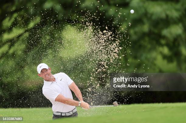 Rory McIlroy of Northern Ireland plays a shot from a bunker on the tenth hole during the third round of the FedEx St. Jude Championship at TPC...