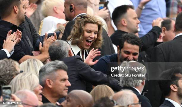 Newcastle United Co-Owners Amanda Staveley and Mehrdad Ghodoussi celebrate in the stands after the team's victory in the Premier League match between...