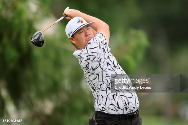 Sungjae Im of Korea plays his shot from the 12th tee during the third round of the FedEx St. Jude Championship at TPC Southwind on August 12, 2023 in...