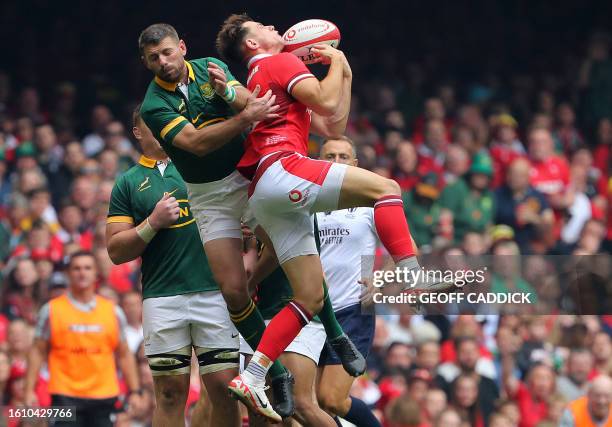 South Africa's full-back Willie Le Roux challenges Wales' wing Tom Rogers during the pre-World Cup Rugby Union match between Wales and South Africa...