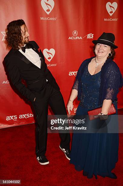 Musician Jason Mraz and and his mother June Tomes attend the 2013 MusiCares Person Of The Year Honoring Bruce Springsteen at Los Angeles Convention...