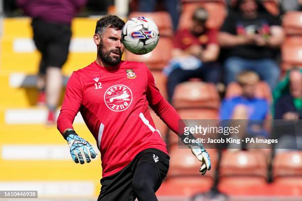 Wrexham goalkeeper Ben Foster warming up ahead of the Sky Bet League Two match at the SToK Racecourse, Wrexham. Picture date: Saturday August 19,...