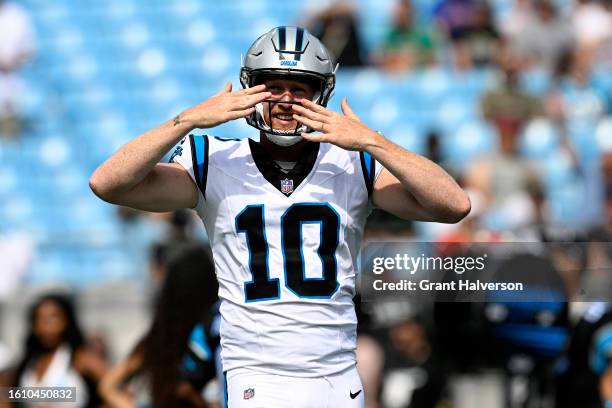 Johnny Hekker of the Carolina Panthers blows kisses to the fans as he warms up before a preseason game against the New York Jets at Bank of America...