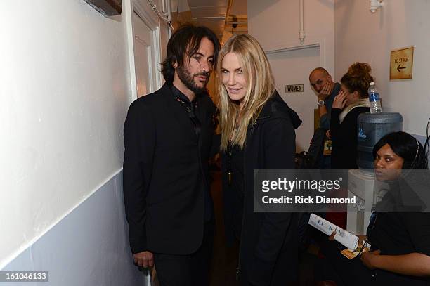 Rami Jaffee and actress Daryl Hannah pose backstage at the GRAMMYs Dial Global Radio Remotes during The 55th Annual GRAMMY Awards at the STAPLES...