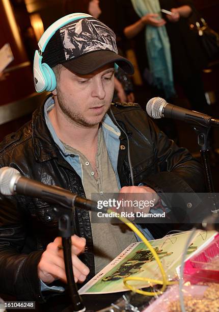 Musician Ryan Tedder of onerepublic is interviewed at the GRAMMYs Dial Global Radio Remotes during The 55th Annual GRAMMY Awards at the STAPLES...