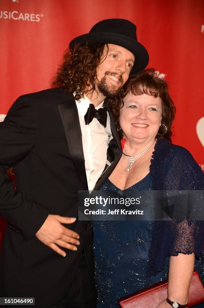 Musician Jason Mraz and his mother June Tomes attend the 2013 MusiCares Person Of The Year Honoring Bruce Springsteen at Los Angeles Convention...