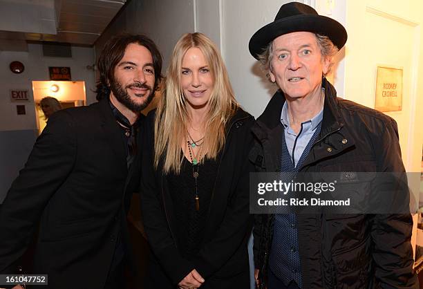 Rami Jaffee of the Wallflowers/Foo Fighters, girlfriend actress/songwriter Daryl Hannah, and Musician Rodney Crowell pose backstage at the GRAMMYs...