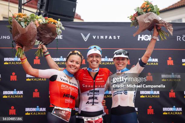 Lisa Norden of Sweden 1st, Justine Mathieux of France 2nd and Susie Cheetham of Britain 3rd on the winner's podium at Ironman Kalmar on August 19,...