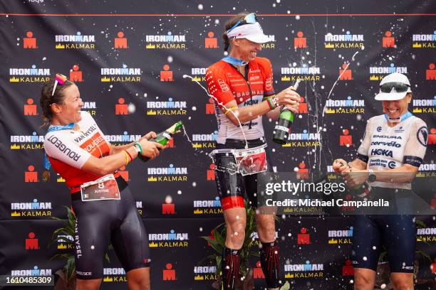 Lisa Norden of Sweden 1st, Justine Mathieux of France 2nd and Susie Cheetham of Britain 3rd on the winner's podium at Ironman Kalmar on August 19,...