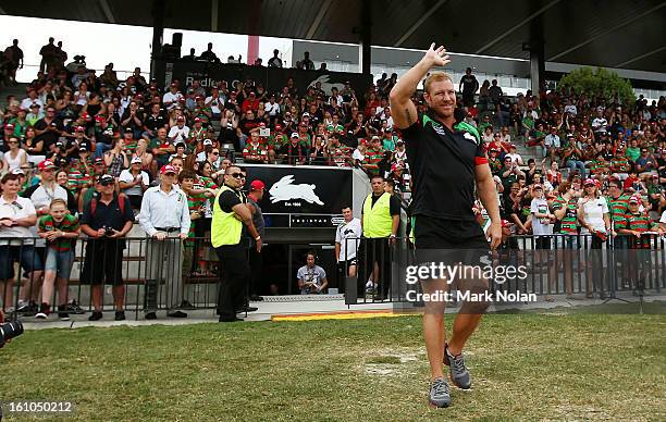 Rabbitohs captain Michael Crocker is introduced to the crowd before the NRL trial match between the South Sydney Rabbitohs and the Papua New Guinea...