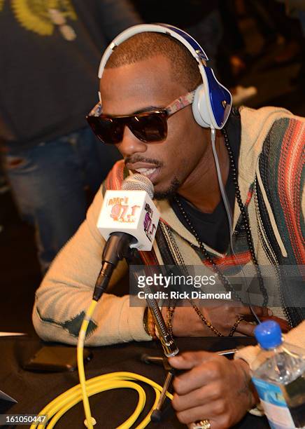 Recording artist B.o.B interviews at the GRAMMYs Dial Global Radio Remotes during The 55th Annual GRAMMY Awards at the STAPLES Center on February 8,...