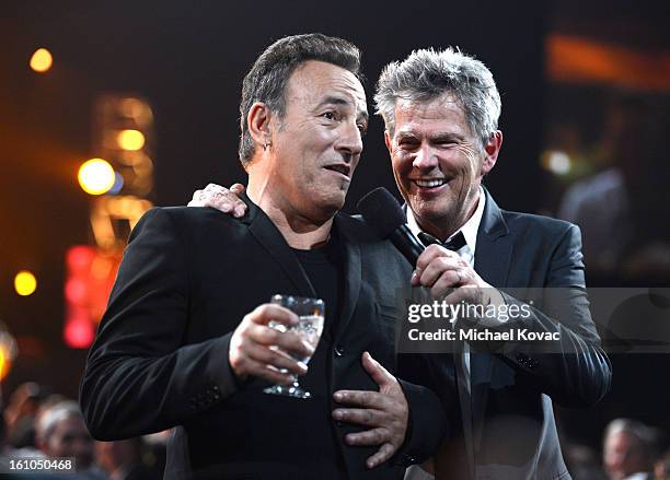 Musician Bruce Springsteen and Producer David Foster attend MusiCares Person Of The Year Honoring Bruce Springsteen at the Los Angeles Convention...