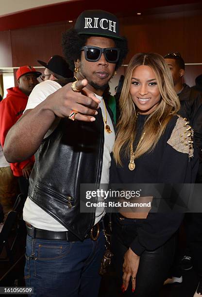 Recording artists Trinidad James and Ciara pose backstage at the GRAMMYs Dial Global Radio Remotes during The 55th Annual GRAMMY Awards at the...