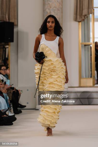 Model walks the runway at the Rotate show during the Copenhagen Fashion Week Spring/Summer 2024 on August 10, 2023 in Copenhagen, Denmark.