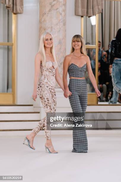 Rotate co-founders Thora Valdimarsdottir and Jeanette Madsen walk the runway at the Rotate show during the Copenhagen Fashion Week Spring/Summer 2024...