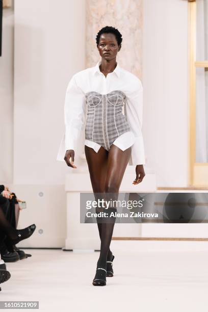 Model walks the runway at the Rotate show during the Copenhagen Fashion Week Spring/Summer 2024 on August 10, 2023 in Copenhagen, Denmark.