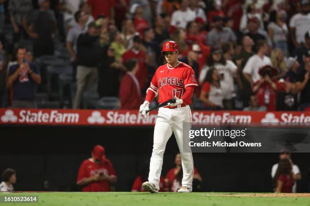 Shohei Ohtani of the Los Angeles Angels walks up to bat against the San Francisco Giants during the seventh inning of a game at Angel Stadium of...
