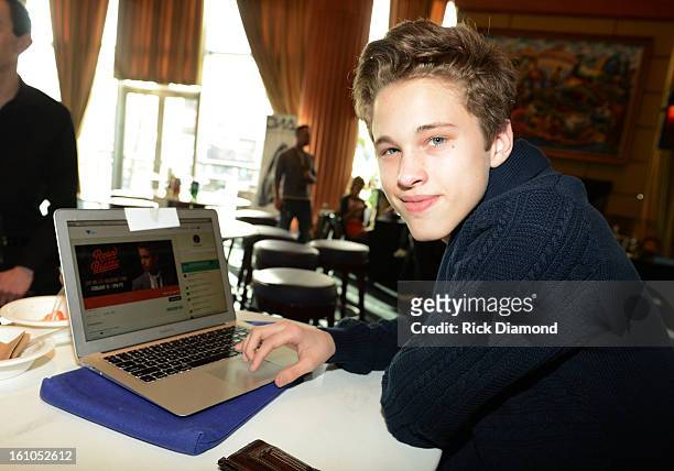 Singer Ryan Beatty poses backstage at the GRAMMYs Dial Global Radio Remotes during The 55th Annual GRAMMY Awards at the STAPLES Center on February 8,...