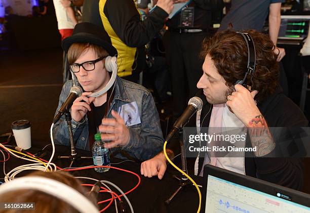 Musicians Patrick Stump and Joe Trohman of Fall Out Boy backstage at the GRAMMYs Dial Global Radio Remotes during The 55th Annual GRAMMY Awards at...