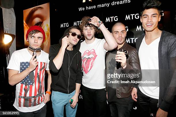 Singers Nathan Sykes, Tom Parker, Jay McGuiness, Max George, and Siva Kaneswaran of The Wanted pose backstage at the GRAMMYs Dial Global Radio...