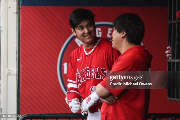 Shohei Ohtani of the Los Angeles Angels reacts in the dugout during the first inning of a game against the San Francisco Giants at Angel Stadium of...