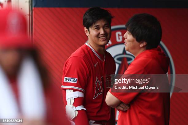 Shohei Ohtani of the Los Angeles Angels reacts in the dugout during the first inning of a game against the San Francisco Giants at Angel Stadium of...