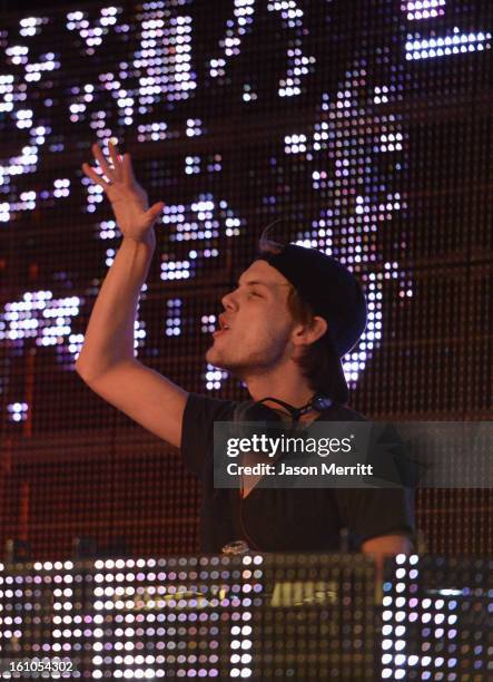 Avicii performs during mPowering Action, a global mobile youth movement at Grammy Week launch, featuring performances by Timbaland and Avicii at The...