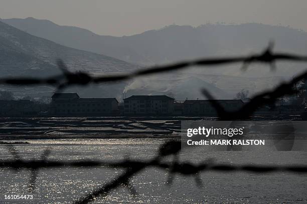 View of the North Korean town of Supung across the Yalu River from the Chinese town of Xiejiagou on February 9, 2013. US Secretary of State John...