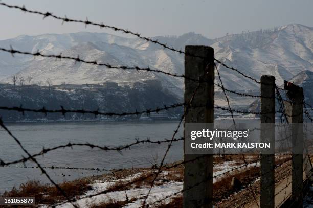 View of the North Korean town of Supung across the Yalu River from the Chinese town of Xiejiagou on February 9, 2013. US Secretary of State John...