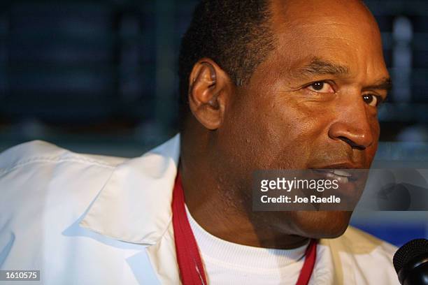 Simpson talks to the media as he attends the hip-hop concert the "The First Damn Birthday Jam" August 24, 2001 at TECO arena in Estero, Florida.