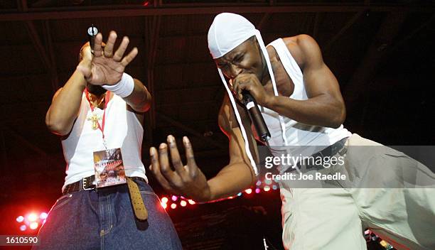 Singers from Wyclef Jean''s band perform August 24, 2001 during the "The First Damn Birthday Jam," a hip-hop concert at TECO arena in Estero, Florida.