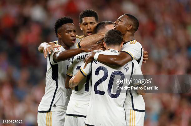 Real Madrid players celebrate after a goal by Rodrygo Goes during the LaLiga EA Sports match between Athletic Club and Real Madrid CF at Estadio de...