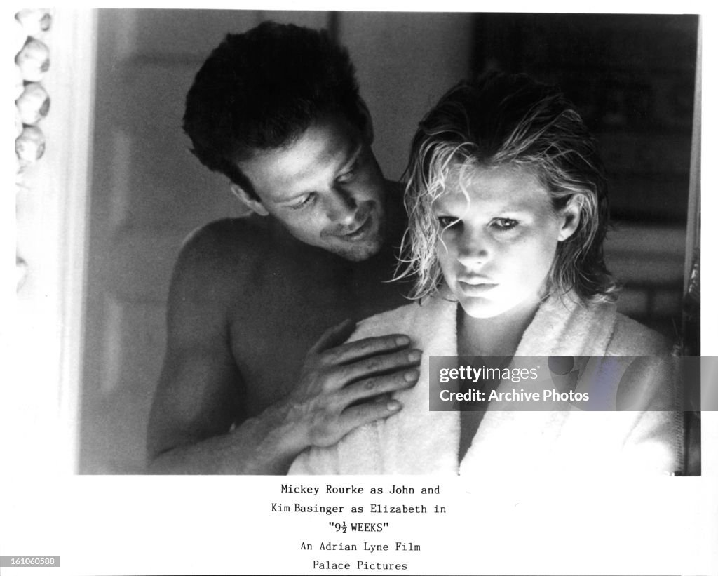 Mickey Rourke holding Kim Basinger in a scene from the film 'Nine 1/2... News Photo Getty Images