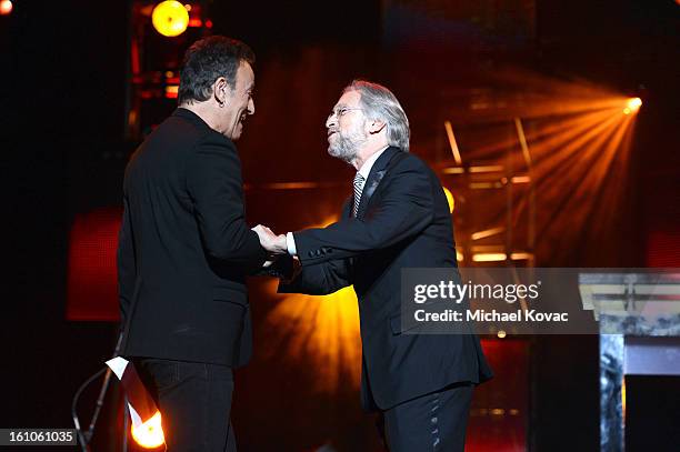 Honoree Bruce Springsteen and NARAS President Neil Portnow speak onstage during the MusiCares Person Of The Year Honoring Bruce Springsteen at the...