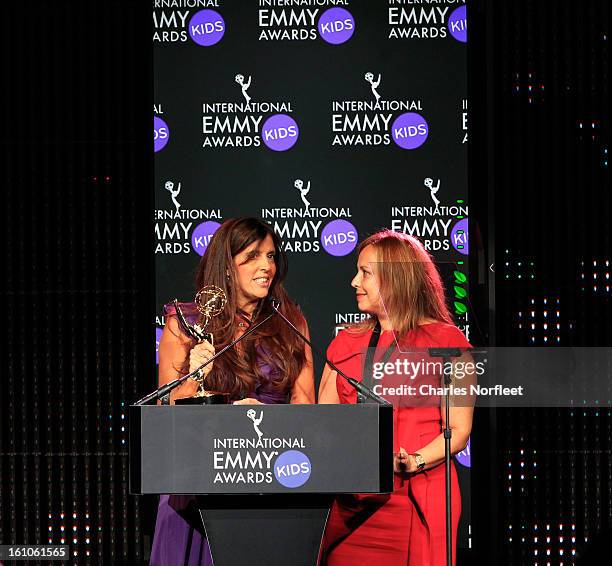 Maria Laura Moure and Cecilia Mendonca from Argentina accept the Kids: Preschool Emmy Award for "El Jardin de Clarilu" during The Inaugural...