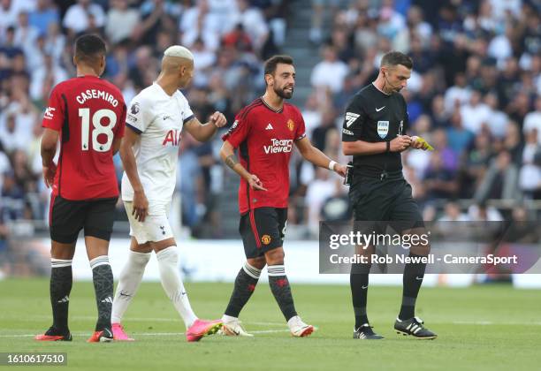 Manchester United's Bruno Fernandes argues with referee Michael Oliver which earned him a yellow card during the Premier League match between...