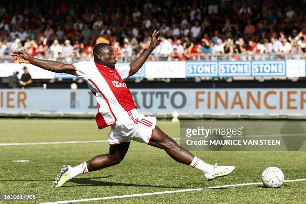 Ajax' Dutch forward Brian Brobbey controls the ball during the Dutch Eredivisie match between Excelsior and Ajax at the Van Donge & De Roo Stadium in...