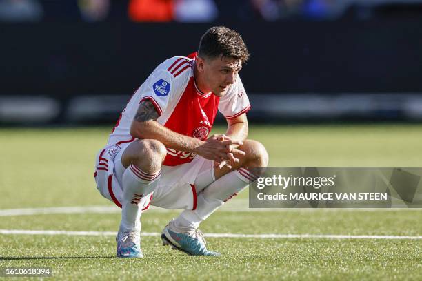 Ajax' Bosnian midfielder Benjamin Tahirovic reacts during the Dutch Eredivisie match between Excelsior and Ajax at the Van Donge & De Roo Stadium in...