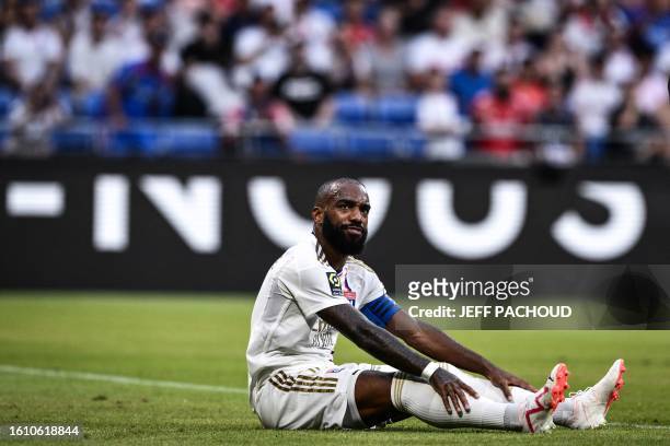 Lyon's French forward Alexandre Lacazette reacts during the French L1 football match between Olympique Lyonnais and Montpellier Herault Sport Club at...
