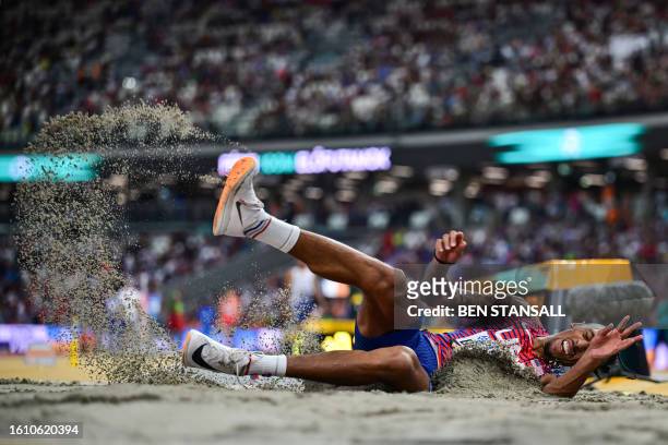 S Chris Benard competes in the men's triple jump qualification during the World Athletics Championships at the National Athletics Centre in Budapest...
