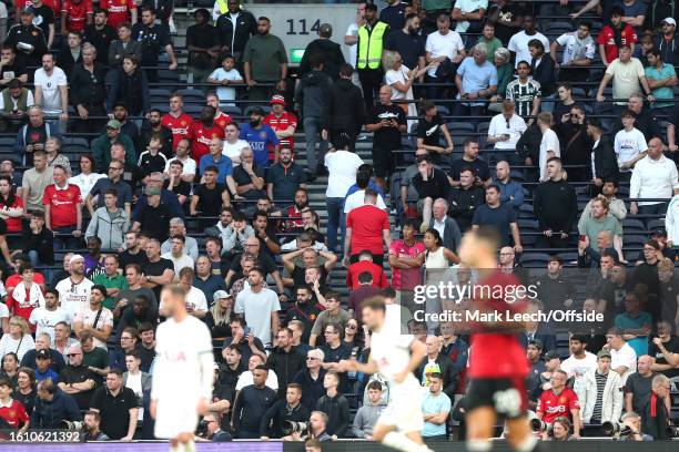 Manchester United supporters depart during the match with their team losing 2-0 during the Premier League match between Tottenham Hotspur and...