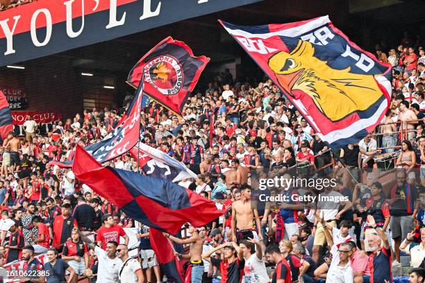 Fans of Genoa wave their flags prior to kick-off in the Serie A TIM match between Genoa CFC and ACF Fiorentina at Stadio Luigi Ferraris on August 19,...