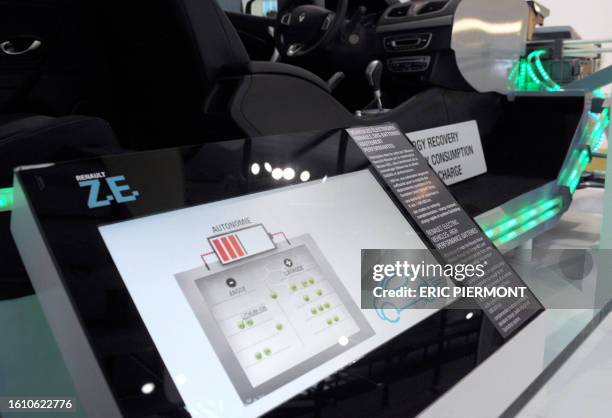 Picture taken at Renault group communication headquarters in Boulogne Billancourt near Paris on January 10, 2011 shows an exhibition of part of an...