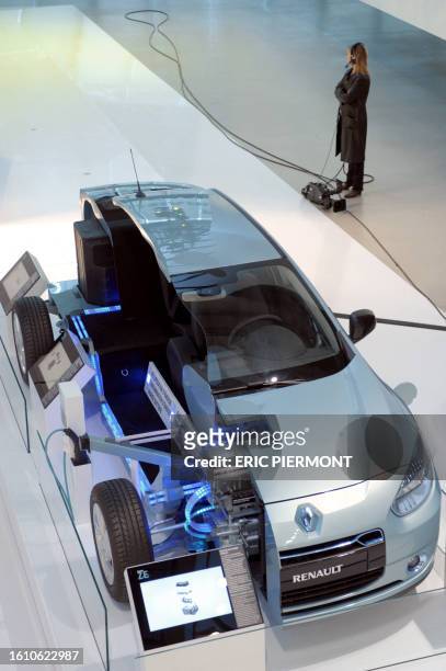 Picture taken at Renault group communication headquarters in Boulogne Billancourt near Paris on January 10, 2011 shows an exhibition of an electric...