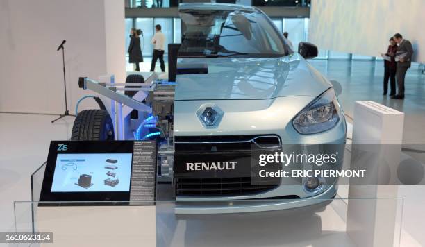 Picture taken at Renault group communication headquarters in Boulogne Billancourt near Paris on January 10, 2011 shows an exhibition of an electric...