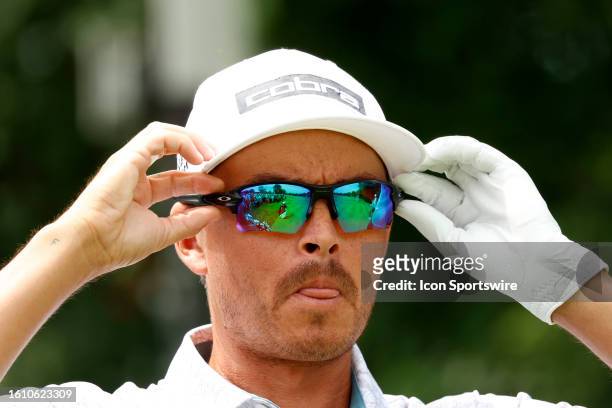 Golfer Rickie Fowler adjusts his sunglasses on the 2nd tee during the third round of the BMW Championship Fed Ex Cup Playoffs on August 19th at...
