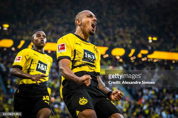 Donyell Malen of Borussia Dortmund celebrates after scoring the 1-0 lead during the Bundesliga soccer match between Borussia Dortmund and 1. FC Köln...