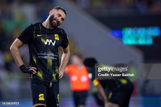 Karim Benzema of Al Ittihad reacts During the Saudi Pro League between Al Ittihad v Al-Tai at Prince Abdullah Al Faisal Stadium on August 19, 2023 in...